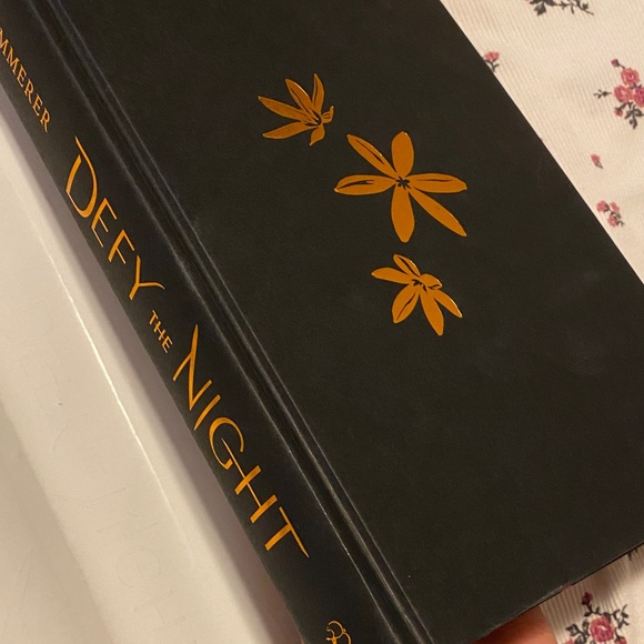 Defy the Night Hardcover Book - Picture 12 of 14